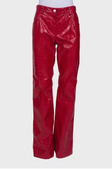 Red embossed trousers with tag