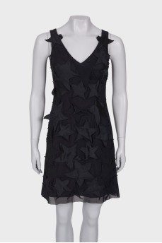 Black dress with star patches