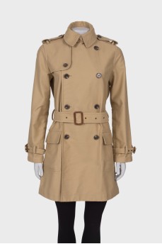 Beige trench coat with pockets