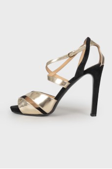 Gold and black heeled sandals