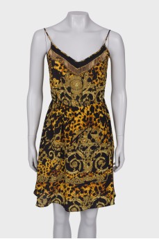 Silk dress in black and gold print
