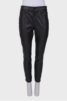 Black eco-leather trousers with tag