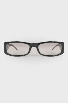 Black glasses with brand logo