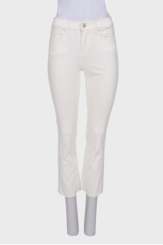 White jeans with raw hem