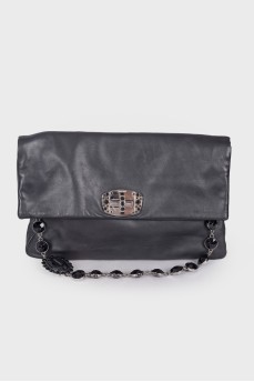 Leather bag with embellished shoulder strap