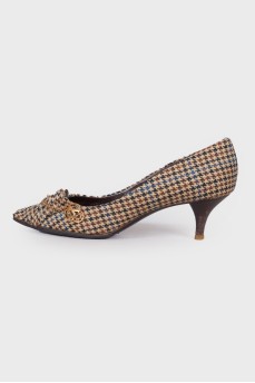 Textile pumps in houndstooth print