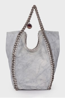 Textile shopper with chain and tag