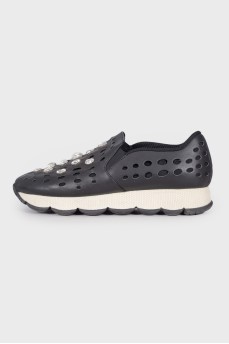Black sneakers with perforations and rhinestones