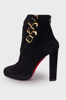 Suede ankle boots with gold buckle