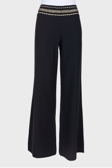 Palazzo trousers with embellished belt