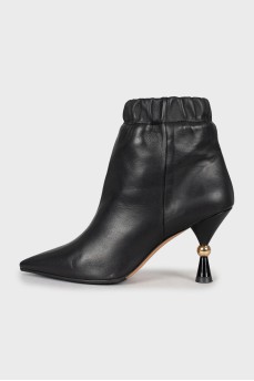 Leather ankle boots with figured heels