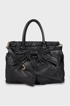 Leather bag with bow