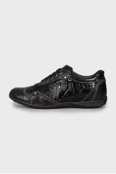 Black embossed sneakers