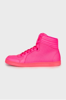 Bright pink trainers with perforations 