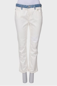White jeans with blue belt
