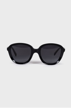 Black sunglasses with shaped frames 