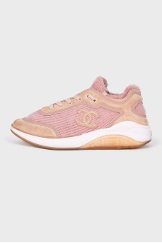 Pink sneakers with brand logo