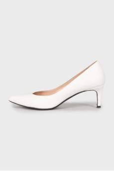 White embossed pumps