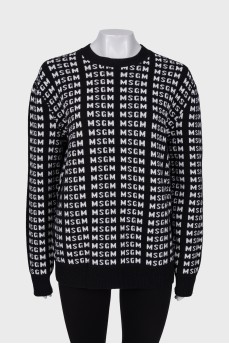 Black and white sweater with brand logo