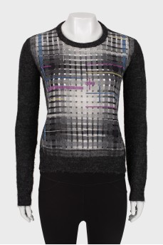 Sweater with perforations and rhinestones