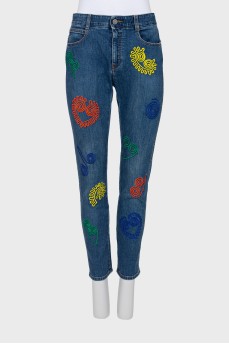 Blue jeans with embroidered print