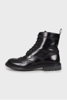 Black boots with perforated leather