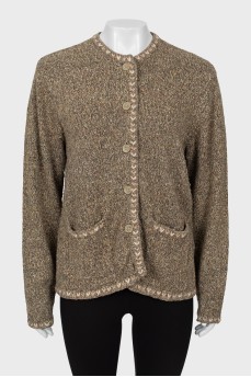 Knitted green jacket with buttons
