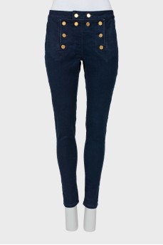 Dark blue jeans with gold buttons