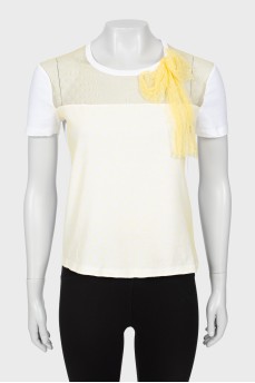 T-shirt decorated with mesh and bow