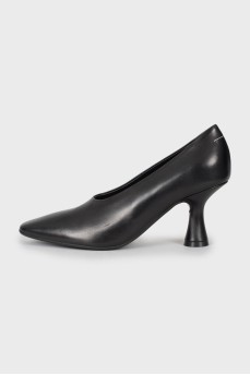 Black shoes with a shaped heel 