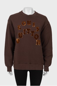 Brown sweatshirt with appliqué