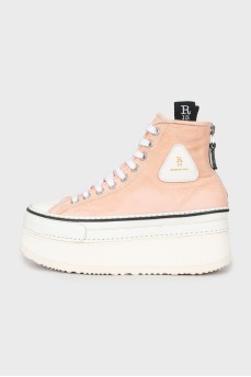 Pink high-heeled sneakers