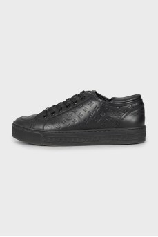 Leather sneakers with branded embossing