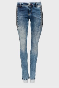 Jeans decorated with rhinestones and lace