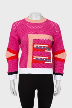 Mixed sweater with perforation