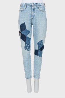 Light blue jeans with patches