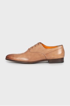 Men's shoes with perforated toe