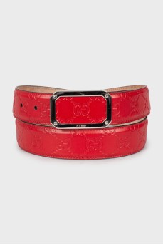 Red belt with signature embossing