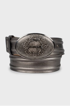 Silver belt with logo on buckle