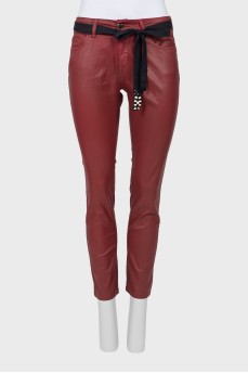 Red trousers with a belt