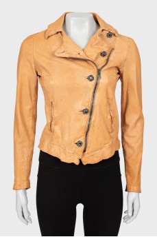 Leather jacket with decorated buttons
