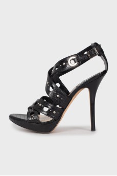 Black sandals with embossed leather