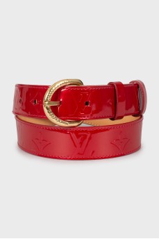 Patent leather belt with signature embossing