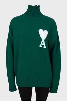 Knitted green wool sweater