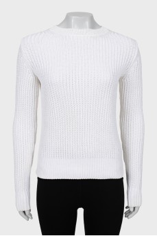 Knitted sweater cropped at the back
