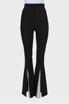 Flared trousers with slits at the bottom