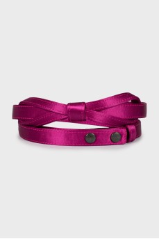 Textile belt with bow