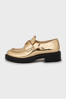 Gold leather loafers