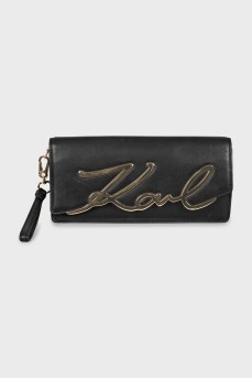 Leather clutch with metal logo