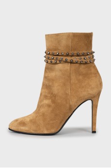Suede ankle boots decorated with studs